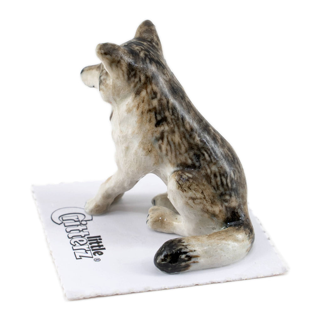 Akela Wolf Sitting Porcelain Miniature